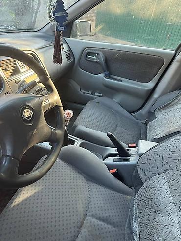 560 sec: Nissan Primera: 2003 г., Механика, Седан — 3