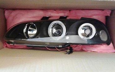 CRNI ANGEL EYES FAROVI OPEL TIGRA (0) | Crni tuning sportski clear