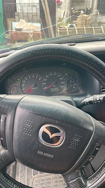 Mazda Tribute: 2002 г., 2 л, Кол менен иштөөчү, Бензин, Кроссовер — 8