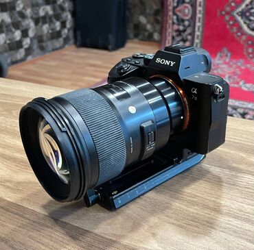 Lens Sigma 50mm ART f/1.4 (ancaq lens) - 1200AZN kamera isə Sony