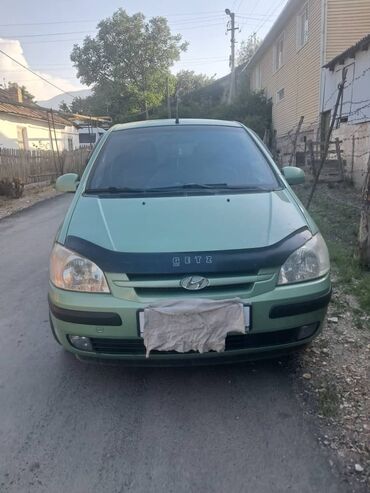 машина для гольфа: Hyundai Getz: 2004 г., 1.4 л, Механика, Бензин, Хэтчбэк