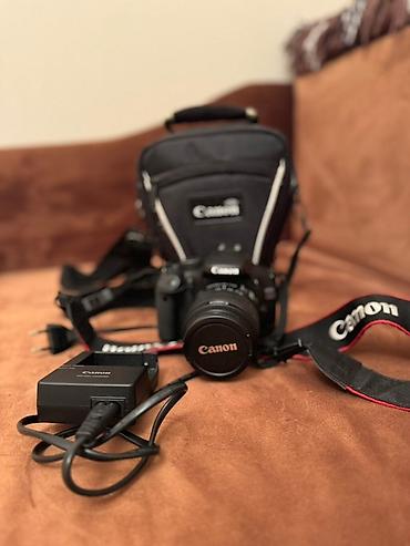 canon 1100d: Canon EOS 1100D fotoaparat. Obyektiv 18–55mm (avtofokus işləkdir — 2