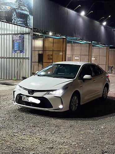 210 cdi: Toyota Corolla: 2019 г., Гибрид, Седан — 2