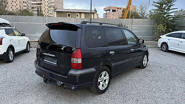 7 местка: Mitsubishi Space Wagon: 2004 г., 2.4 л, Механика, Бензин, Минивэн — 8