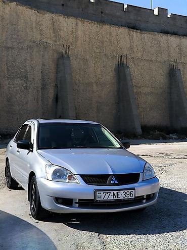mitsubishi az: Mitsubishi Lancer: 1.6 l | 2006 il 350000 km Sedan — 1