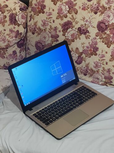 işlənmiş noutbuklar: Asus problemi yoxdu bataryasi ilk gunku kimi saxlayir donmasi yoxdu