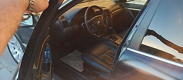mini cooper 2009: BMW 7 series: 2.8 l | 1997 il Sedan — 6