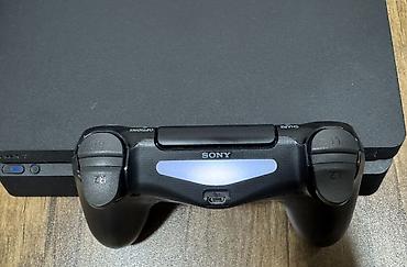 Видеоигры и приставки: Sony PlayStation 4 Slim 1TB Tam ideal vəziyyətdə. İngiltərədən alınıb — 4