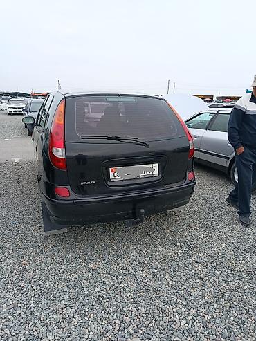 almera: Nissan Almera Tino: 2009 г., Минивэн — 2