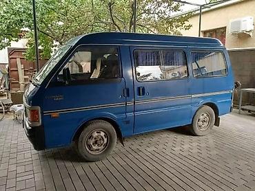форд эколайн: Синий фургон Ford Econovan, оснащенный четырьмя боковыми окнами и — 4