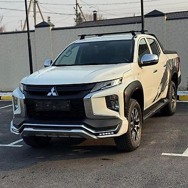 crv 2: Mitsubishi L200: 2023 г., Механика, Бензин, Пикап — 3