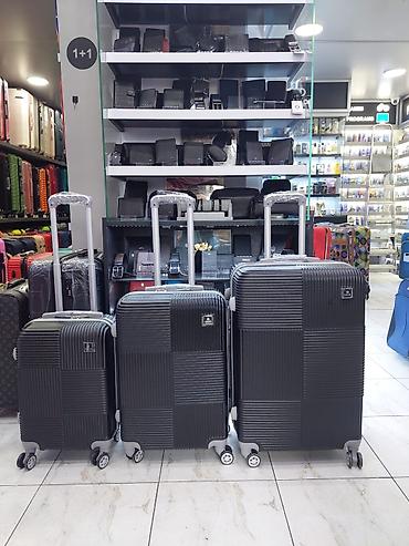 Çamadanlar: Sərt korpuslu çamadan dəsti – 3 ölçü - Ölçülər: böyük, orta və əl yükü — 1