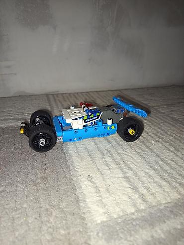 кукла купить: Конструктор LEGO Technic — полицейский гоночный автомобиль - Модель — 2