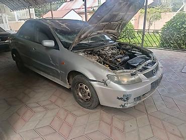 Mazda: Mazda 323: 2002 г., 1.6 л, Механика, Бензин, Седан — 8