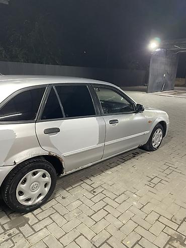 мини электро: Mazda 323: 2003 г., 1.3 л, Механика, Бензин, Хэтчбэк — 3