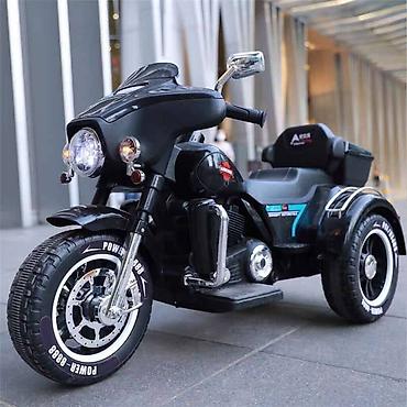oyuncaq it: Yeni model uşaq elektrik motosikleti. üç təkərli akkumulyatorlu uşaq — 8