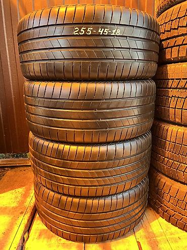 stud 100: Шины 255 / 45 / R 18, Лето, Б/у, Комплект, Германия, Bridgestone — 1