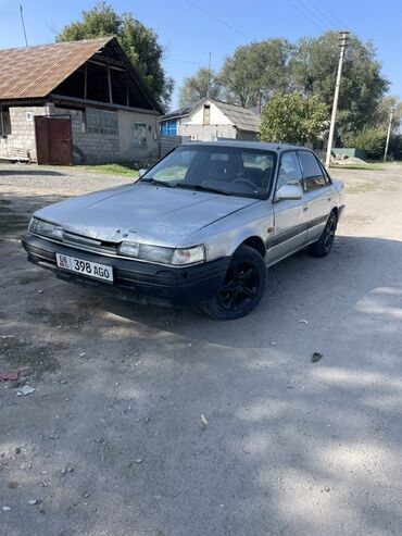 спринтер грузовой средний база: Mazda 626: 1991 г., 2 л, Механика, Бензин, Седан