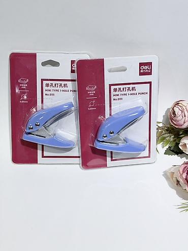 Канцтовары: Мини-дырокол Deli, модель No.0111 — односторонний (1-hole punch) — 1