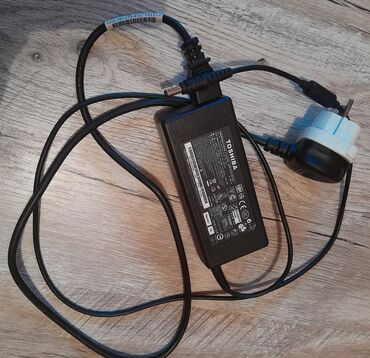 телефон fly mc100 блок питания: Noutbuklar üçün nəzərdə tutulmuş Toshiba brendinə məxsus adapter at lalafo.az телефон fly mc100 блок питания: Noutbuklar üçün nəzərdə tutulmuş Toshiba brendinə məxsus adapter