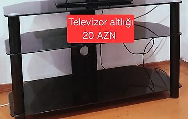 TV altlığı: Televizor Altlığı. İşlənmişdir ama çox yaxşı vəziyyətdədir. Qiymət — 1