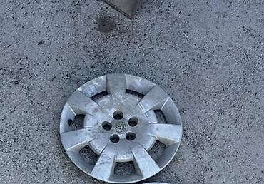 275 65 20: Колпак колесный Toyota - Оригинальный колпак на стальное колесо - — 1