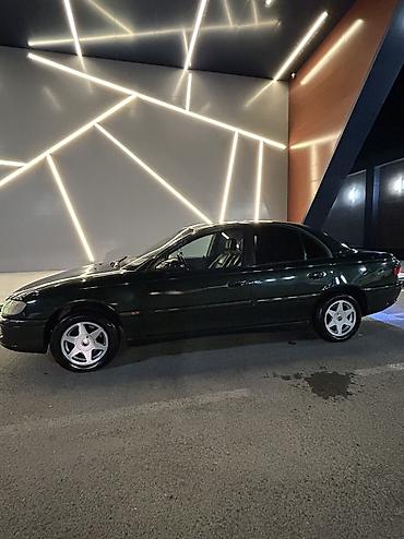 opel omega b: Opel Omega: 2 l | 1994 il 450000 km Sedan — 5