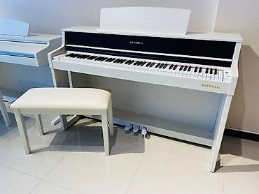 Musiqi alətləri: Koreya istehsali olan dünya şöhrətli Kurzweil pianoları. Sevimli — 1