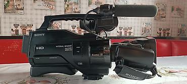 Видеокамеры: Профессиональная видеокамера Sony HXR‑MC1500 - Формат записи: AVCHD — 6