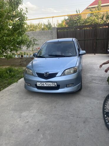 Mazda: Mazda Demio: 2004 г., 1.4 л, Механика, Бензин, Универсал
