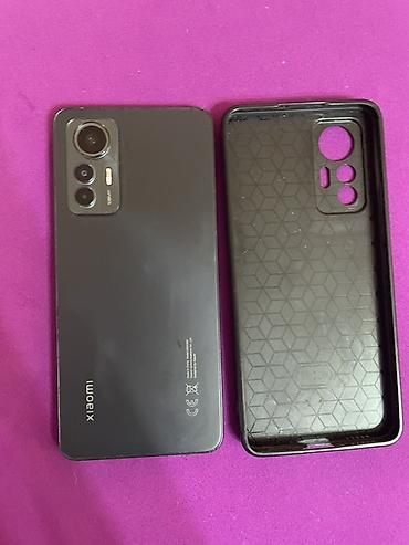 redmi note 12 kabro: Xiaomi 12 Lite, 128 GB, rəng - Boz, 
 Face ID, İki sim kartlı — 1
