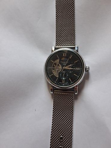 takema saat: Tissot mexaniki qol saatı - Korpus: parlaq metal (gümüşü ton) — 2