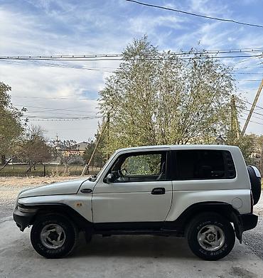 сибирия: Ssangyong Korando: 2001 г., 2.9 л, Механика, Дизель, Внедорожник — 5
