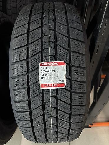 Шины 285 / 45 / R 21, Зима, Новый, Комплект, Внедорожные (АТ/МТ), Япония, Bridgestone at lalafo.kg Шины 285 / 45 / R 21, Зима, Новый, Комплект, Внедорожные (АТ/МТ), Япония, Bridgestone