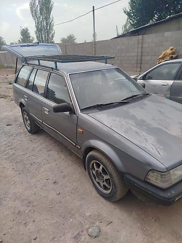 Mazda: Mazda 323: 1990 г., Механика, Бензин, Универсал — 7