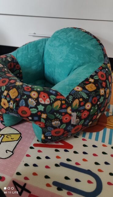 ostio вытягивающая ортопедическая подушка: Подушка сидушка для детей.Помогает учить ребенка сидеть ровно. Очень
