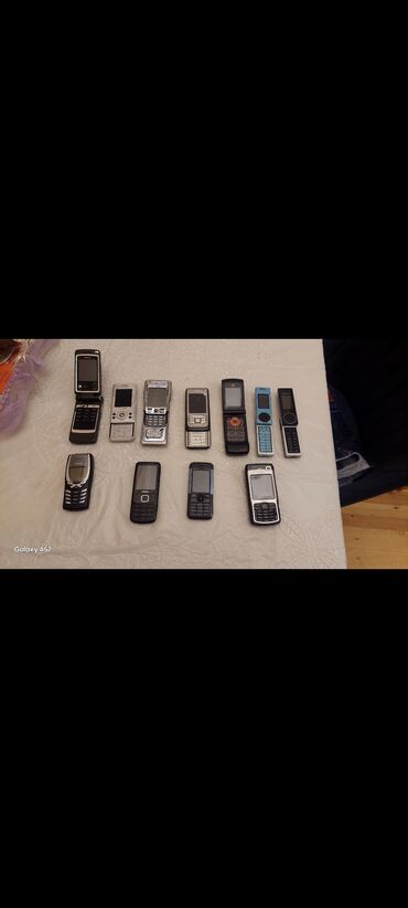120 manata telefon: Nokia N91, rəng - Ağ, Düyməli