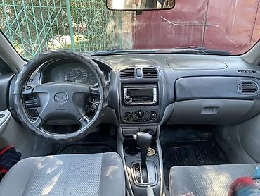 mazda 323 2003: Mazda 323: 2003 г., 1.6 л, Автомат, Бензин, Универсал — 6