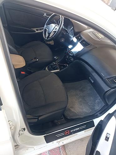 rota grid: Hyundai Accent: 2012 г., Механика, Седан — 1