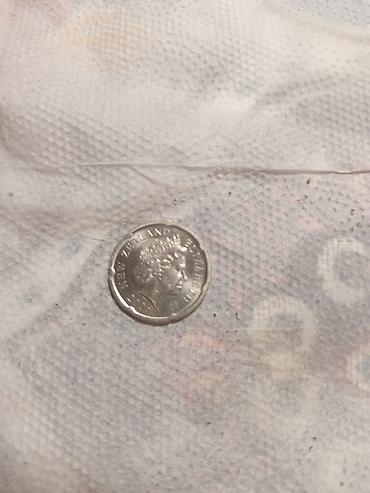 20: Məhsul: 20 sentlik sikkə (Yeni Zelandiya) Təsvir: - Nominal: 20 cents — 1