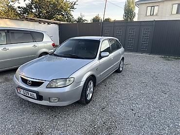 Mazda: Mazda 323: 2002 г., 1.6 л, Механика, Бензин, Универсал — 3