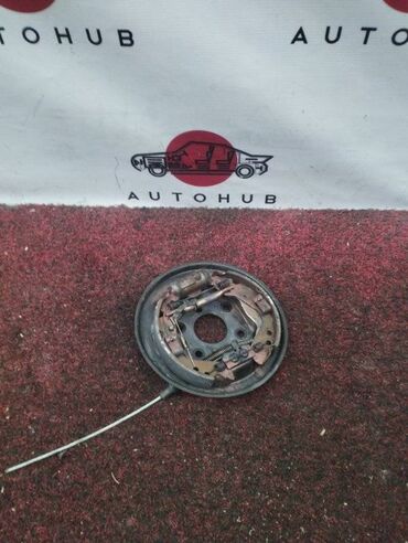 Другие детали тормозной системы: Механизм ручного тормоза HONDA FIT GD1 L13A 2002 задн. прав. (б/у)