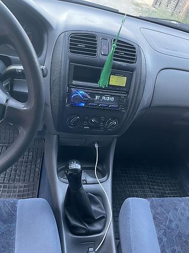 машинка б у: Mazda 323: 1999 г., 1.6 л, Механика, Бензин, Седан — 5