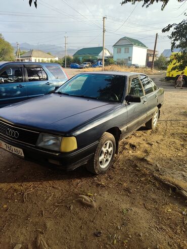 купить запчасти на опель вектра б: Седан Audi 100 серого цвета, классическая модель с характерными