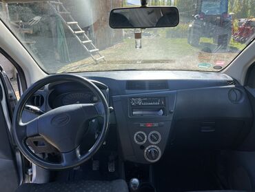 наклейка на машину: Daihatsu Cuore: 2008 г., 1 л, Механика, Бензин