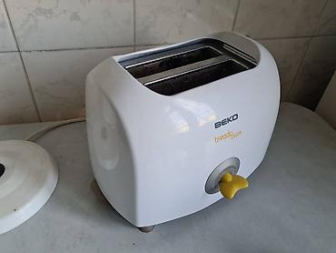 новый тошок: Тостер в хорошем состоянии. 
BEKO
Рабочий.
отключается только вручную — 2