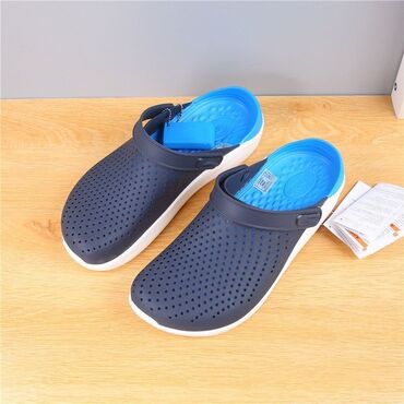 плащ мужская: Кроксы (Crocs) — это легкая, удобная и водонепроницаемая обувь из