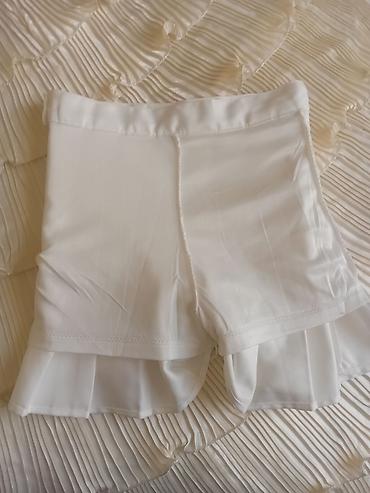 çaplı qadın ətəkləri: Ağ plisəli mini skirt-şort (skort) - Rəng: qar kimi ağ - Dizayn: ön — 3