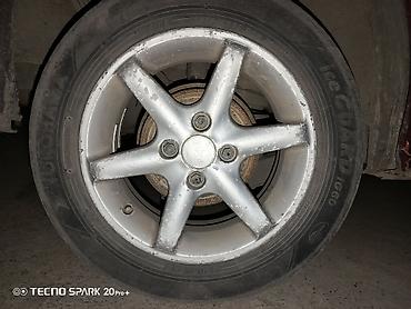Дөңгөлөктөр монтажда: Дөңгөлөктөр монтажда 175 / 65 / R 14, Кыш, Колдонулган, Комплект, Жеңил унаалар, Куйма, тешиктери - 4 — 4