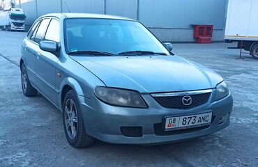 mazda verisa: Mazda 323: 2002 г., 1.6 л, Механика, Бензин, Хэтчбэк